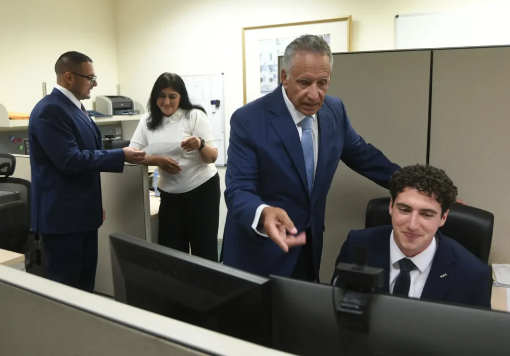 Anthony Incorvaia and the team at work in the Jericho office